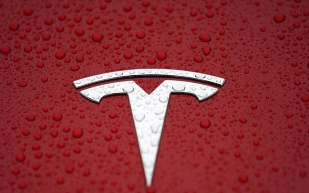 Tesla ends above $1 tn in value, Dow and S&P 500 at records