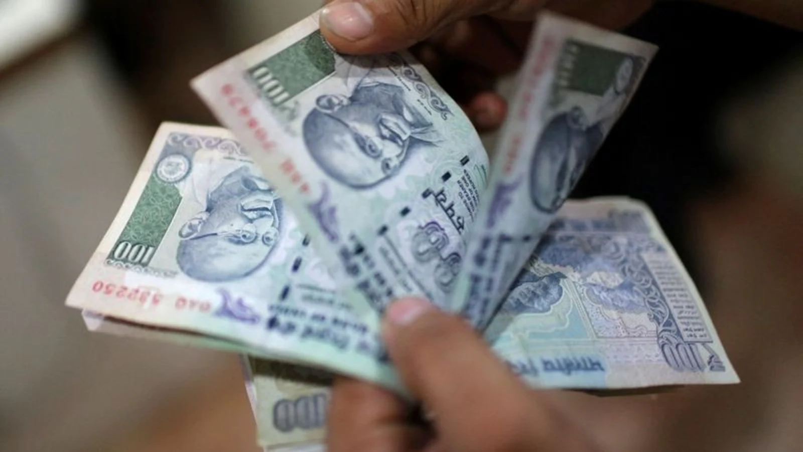 Indian rupee hits lifetime low as global crude oil prices soar
