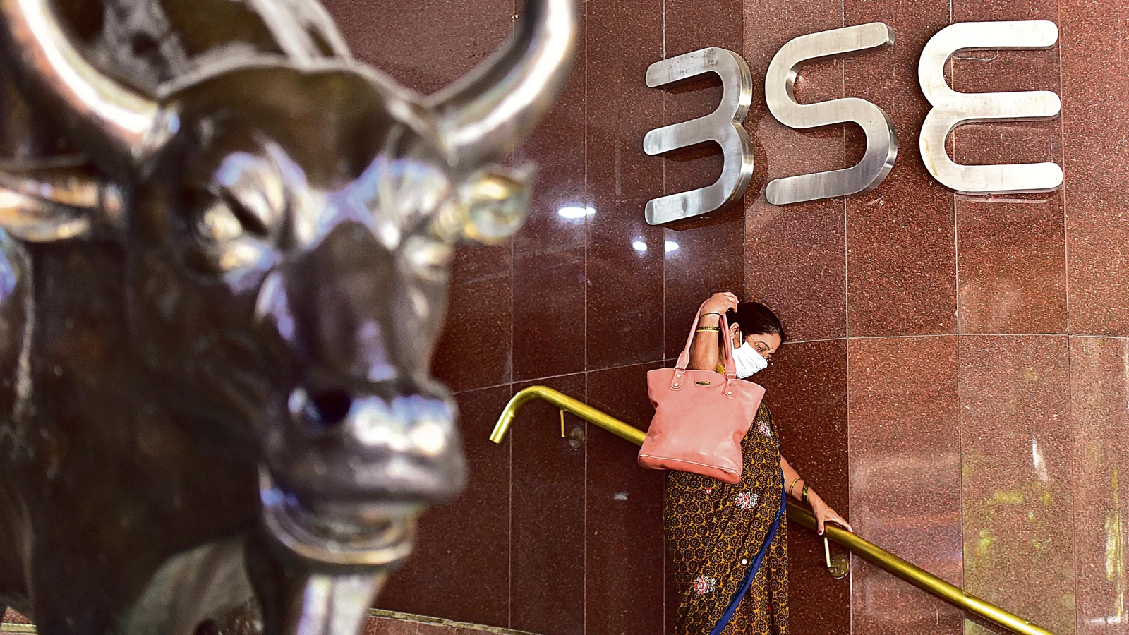 Markets begin week in red; Sensex opens near 56,000, Nifty at 16,700